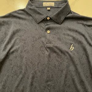 Lightly worn Peter Millar Golf Polo with B for Blackrock on front. Dark navy